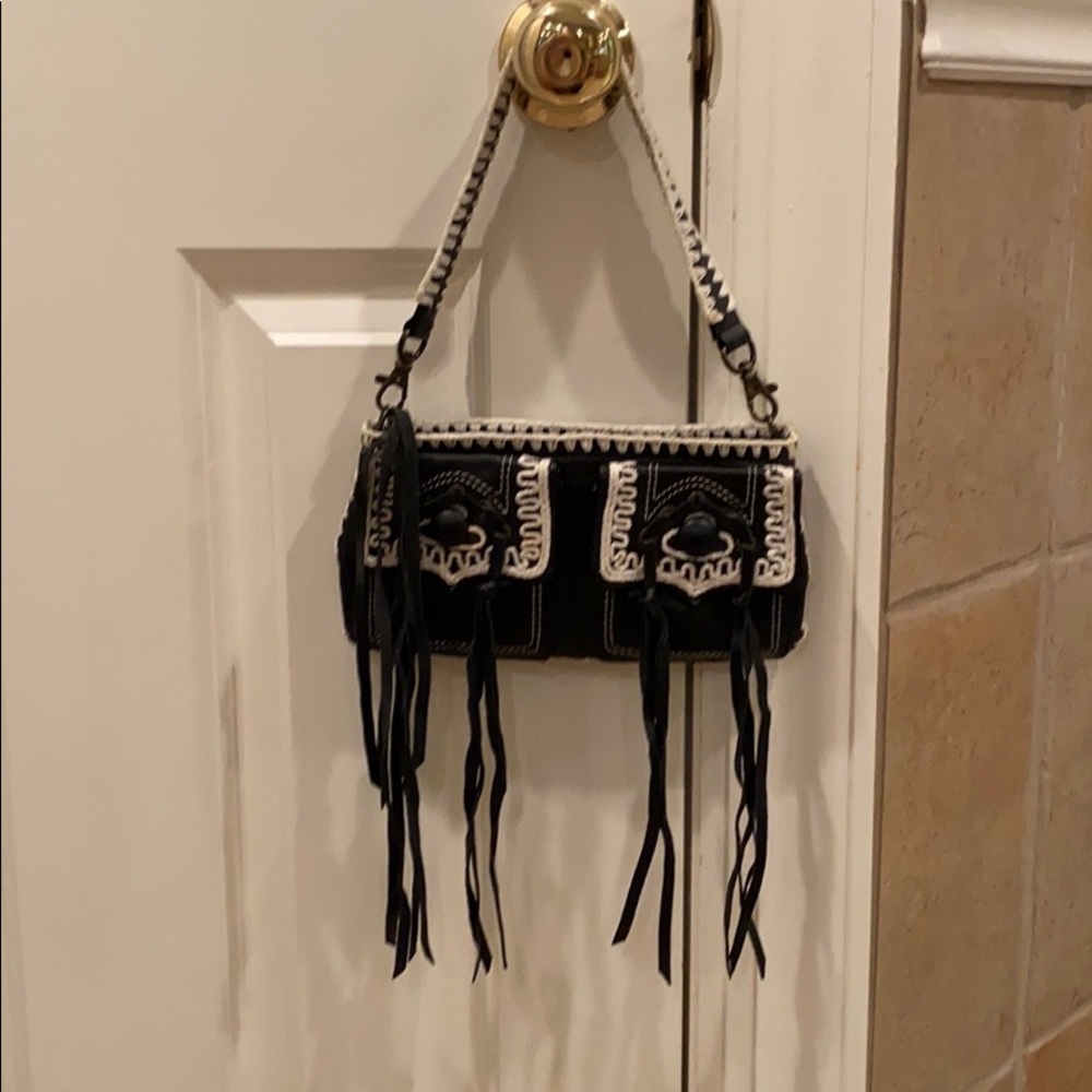 Betsy Johnson leather shoulder bag with fringe